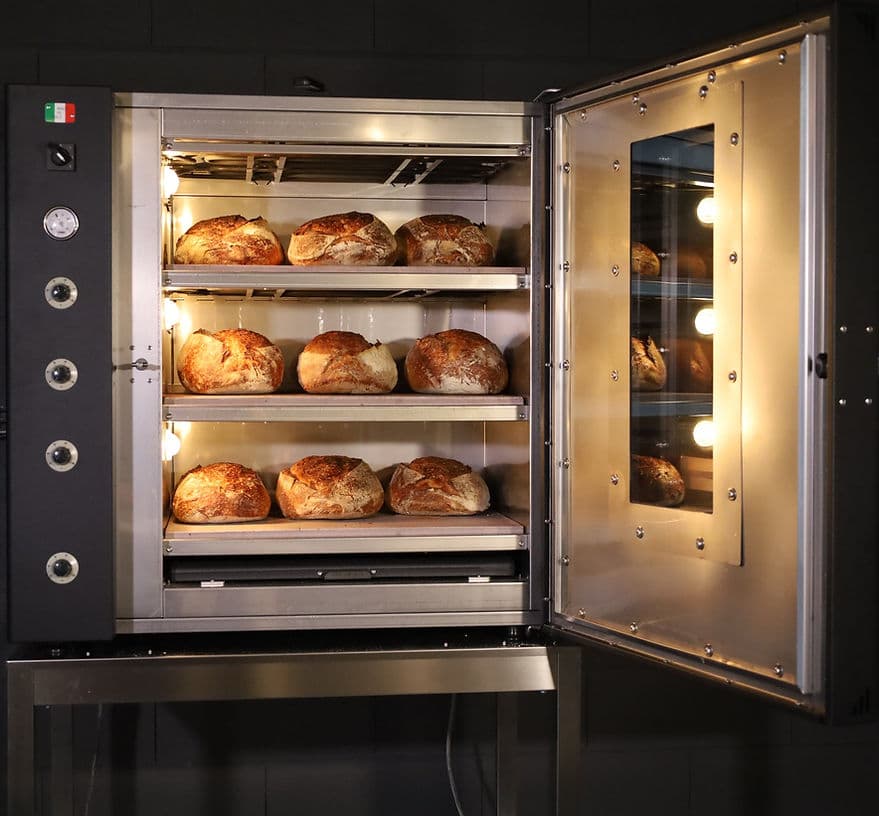 Three decks loaded with bread
